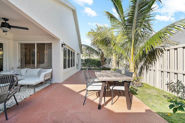 view of patio / terrace with ceiling fan and outdoor lounge area