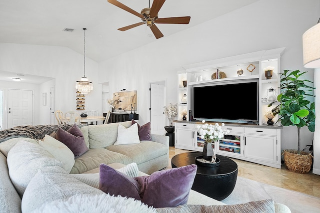 living room with lofted ceiling and ceiling fan