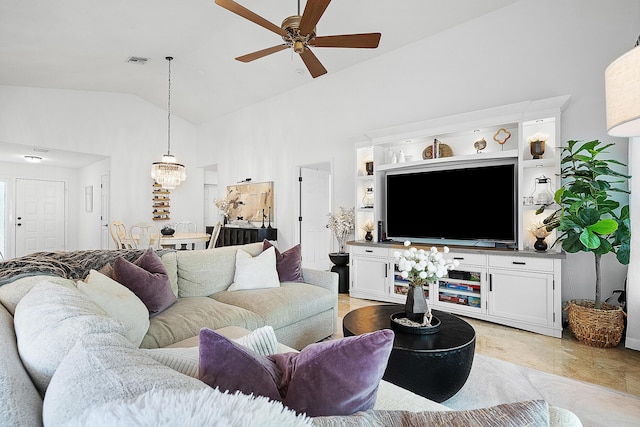 living room featuring visible vents, ceiling fan, and high vaulted ceiling