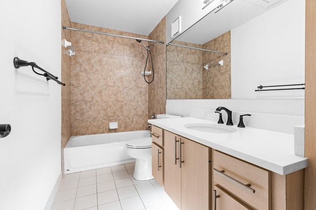 full bathroom with tile patterned floors, vanity, toilet, and tiled shower / bath