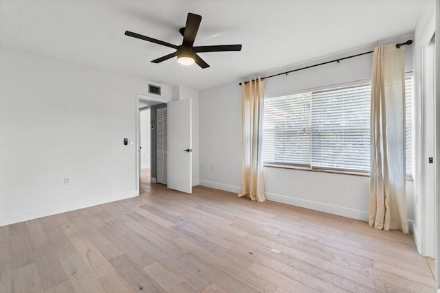 unfurnished bedroom with ceiling fan and light hardwood / wood-style floors