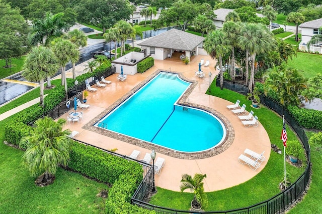 view of swimming pool with a patio