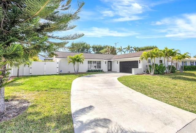 single story home featuring a front yard and a garage