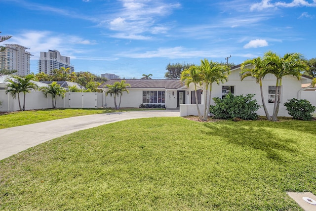 view of front of home featuring a front lawn