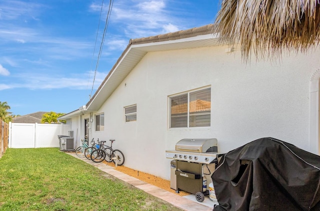 view of home's exterior featuring a yard