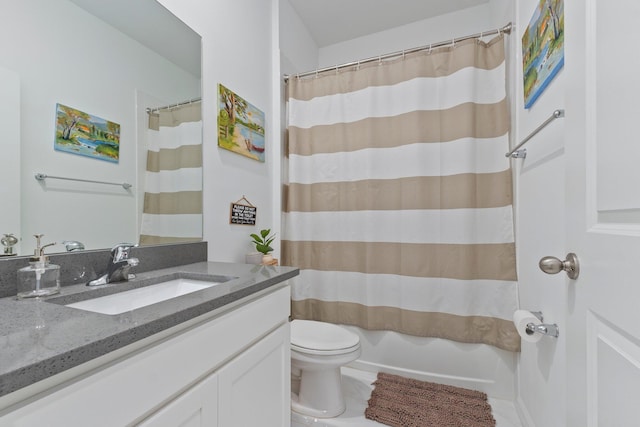 full bathroom with toilet, vanity, and shower / bath combo