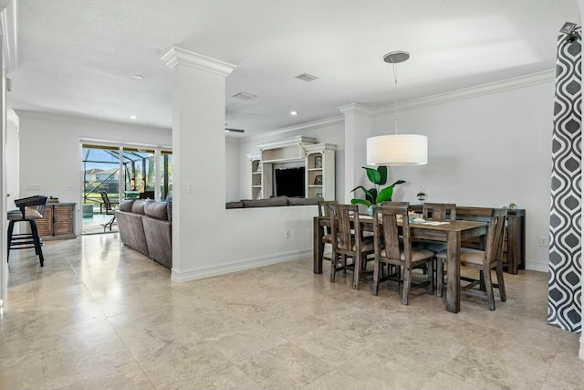 dining area featuring crown molding