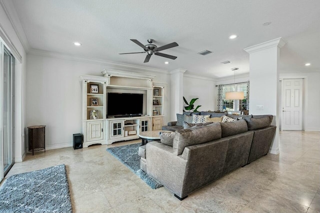 living room with ceiling fan and ornamental molding