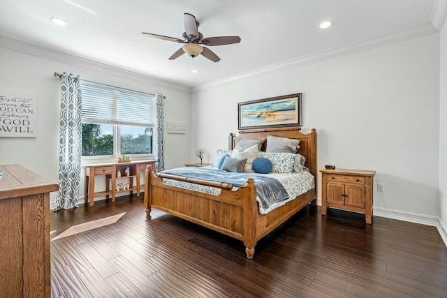 bedroom featuring dark wood-type flooring, ceiling fan, and ornamental molding