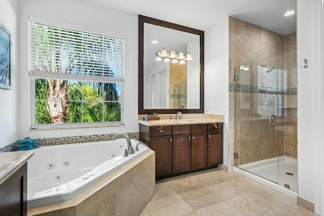 bathroom with vanity and plus walk in shower