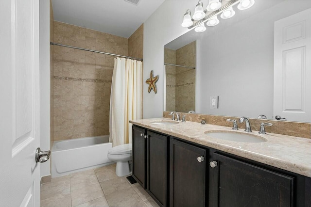 full bathroom with toilet, vanity, tile patterned floors, and shower / tub combo with curtain