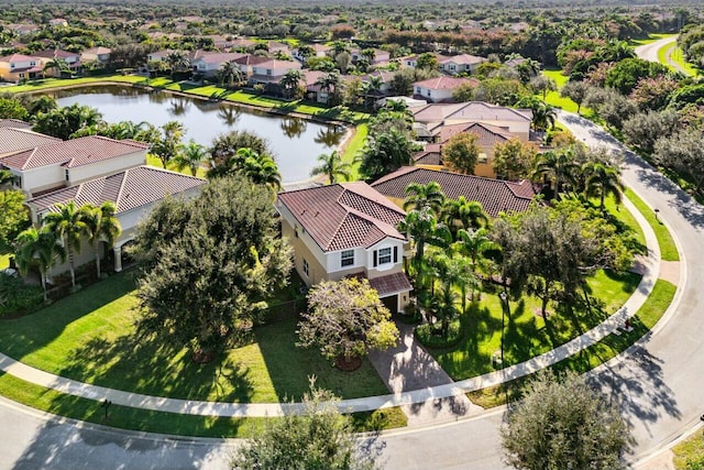 drone / aerial view with a water view