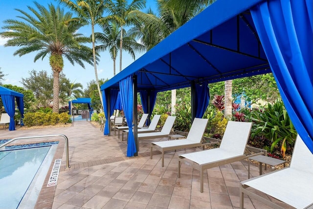 view of patio with a community pool