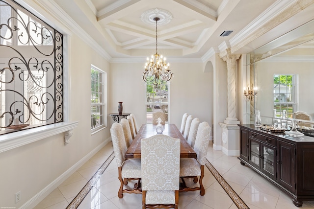 dining room with visible vents, baseboards, arched walkways, and an inviting chandelier