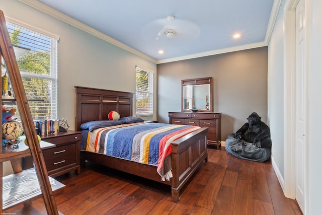 bedroom with recessed lighting, crown molding, baseboards, and dark wood-style flooring