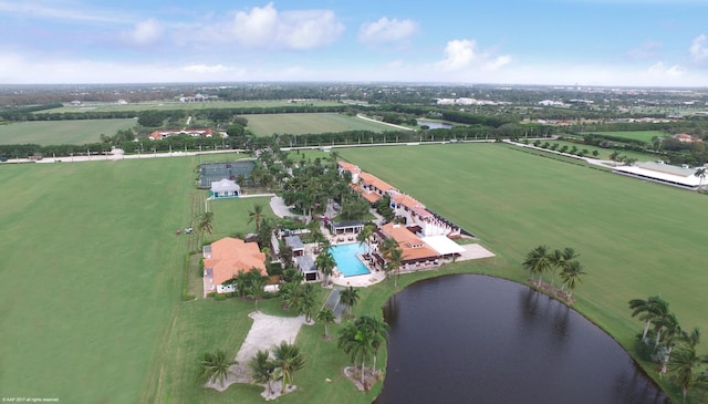 birds eye view of property with a rural view and a water view