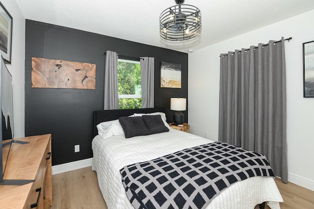 bedroom featuring light hardwood / wood-style flooring