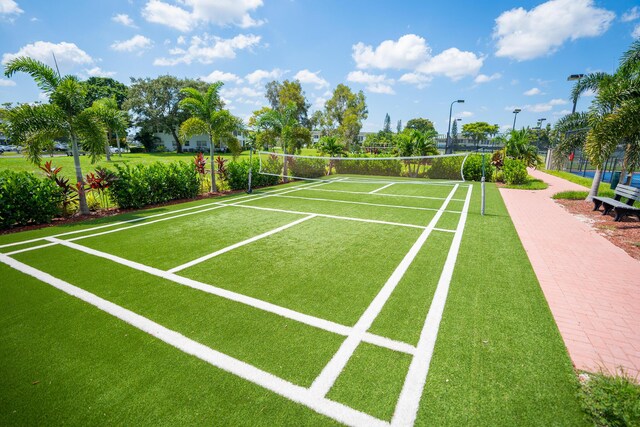 surrounding community featuring volleyball court