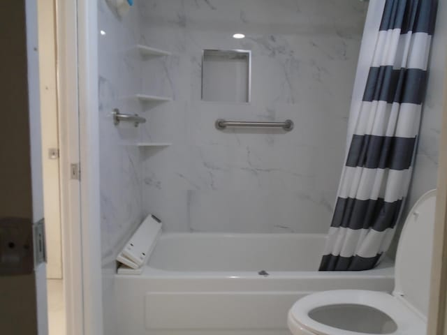 bathroom with shower / bathtub combination with curtain and toilet