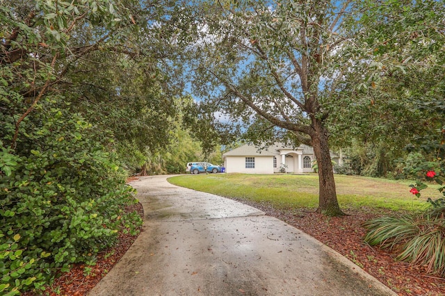 view of front of home with a front lawn