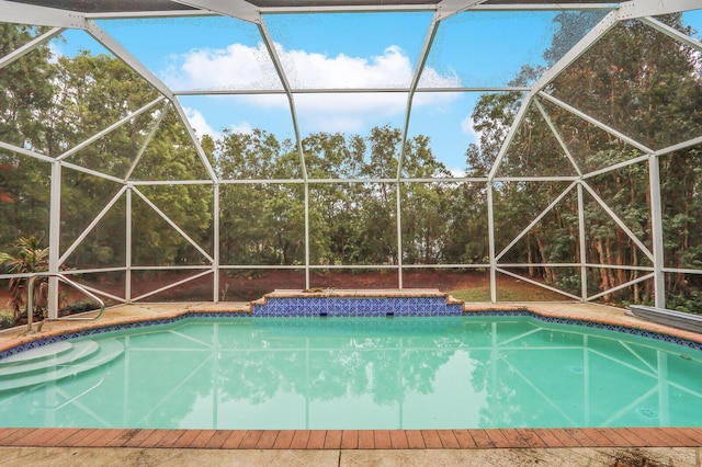 view of pool featuring a lanai