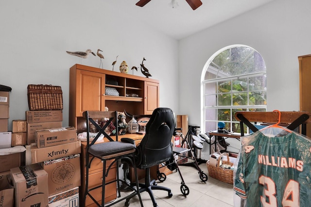 office space featuring light tile patterned floors and ceiling fan