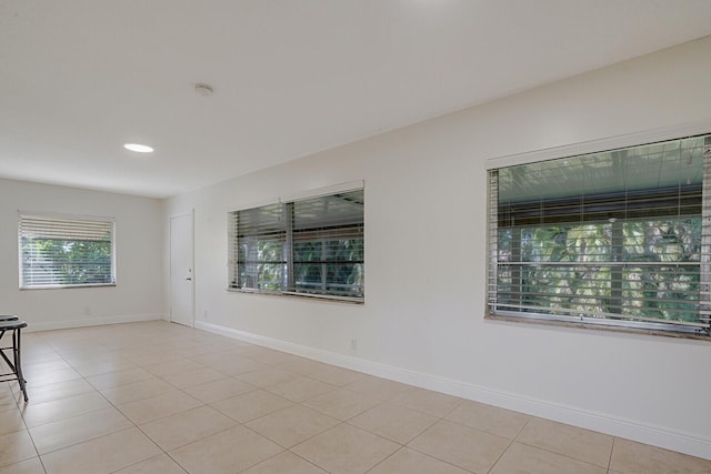 empty room featuring light tile patterned floors