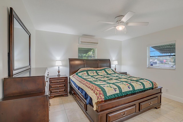 tiled bedroom featuring a wall mounted air conditioner and ceiling fan