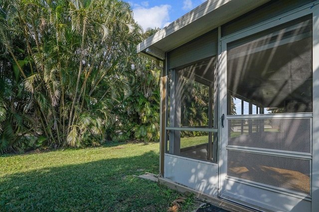 view of yard with a sunroom