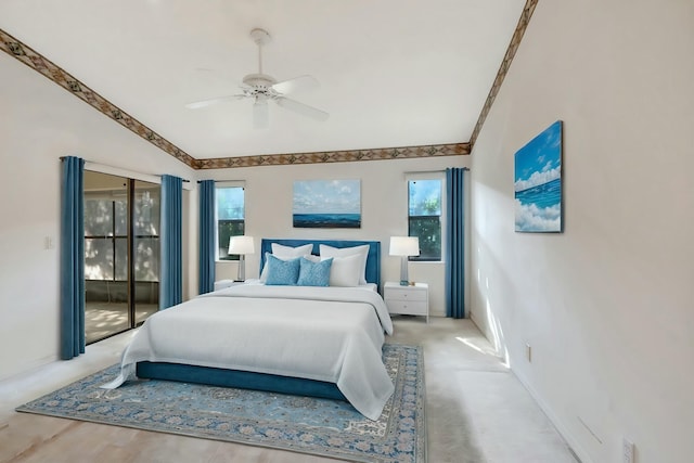 bedroom featuring multiple windows and ceiling fan