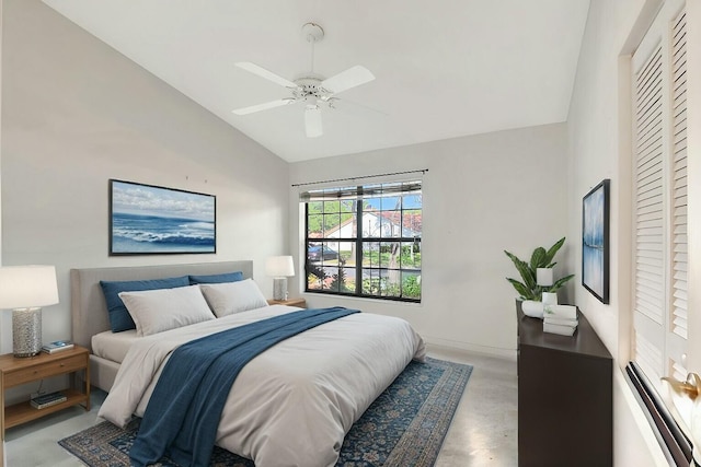 bedroom featuring lofted ceiling and ceiling fan