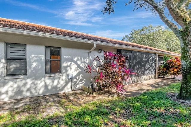 view of property exterior with stucco siding