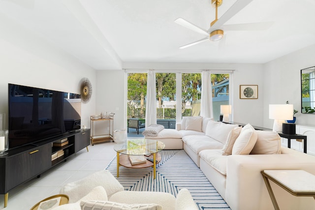 tiled living room featuring ceiling fan