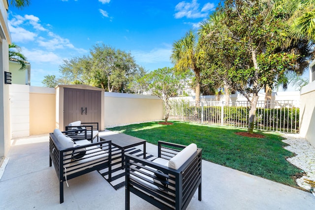 view of patio / terrace featuring outdoor lounge area and a shed