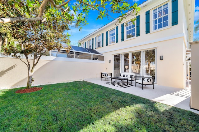 exterior space featuring outdoor lounge area and a patio