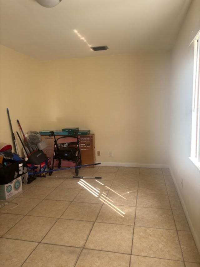 interior space featuring tile patterned flooring