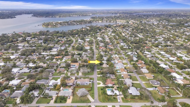 drone / aerial view featuring a water view