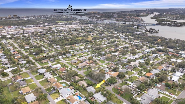 bird's eye view with a water view