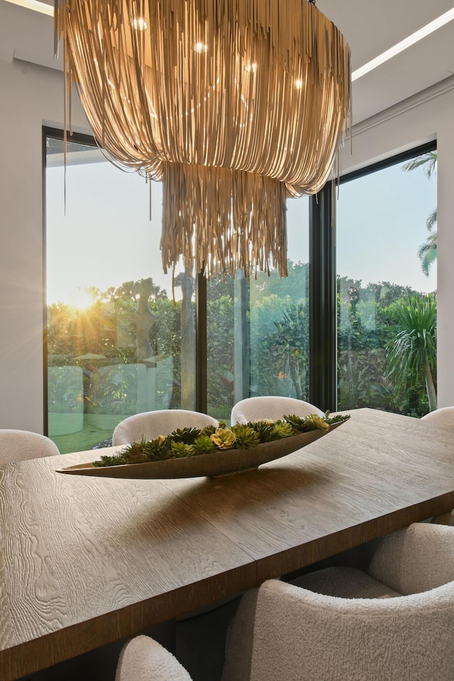 dining room with a notable chandelier