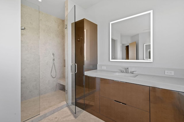 bathroom with vanity, tile patterned floors, and an enclosed shower