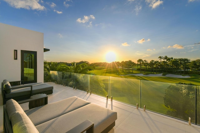 view of patio terrace at dusk