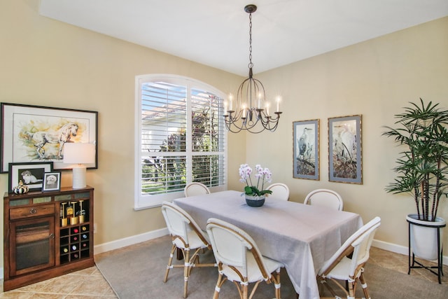 dining room featuring a chandelier