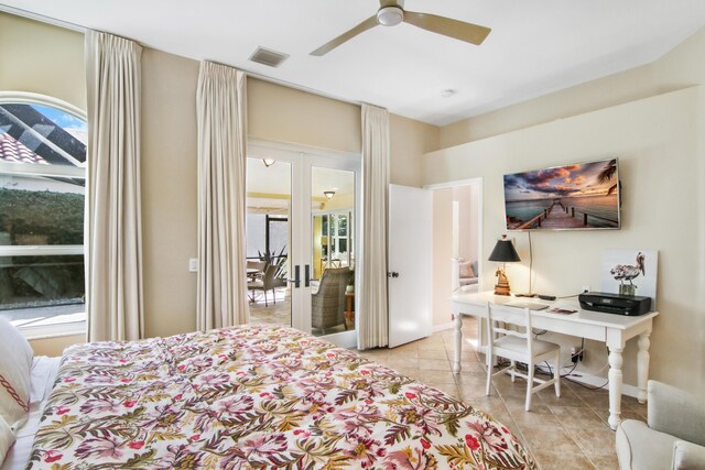 bedroom with ceiling fan, light tile patterned floors, french doors, and access to exterior