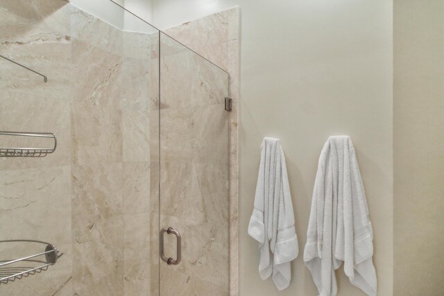 bathroom with vanity and a tub