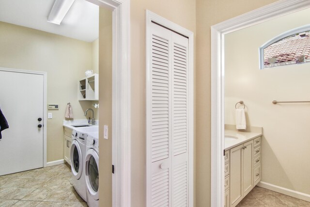 bathroom with vanity, tile patterned floors, a wealth of natural light, and an inviting chandelier