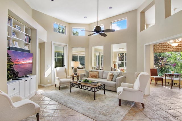 sunroom with ceiling fan