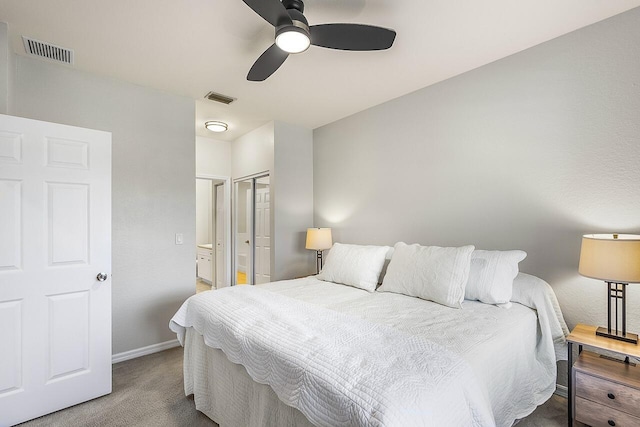 bedroom with ceiling fan, a closet, and carpet floors