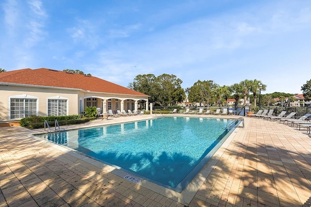 view of pool featuring a patio area