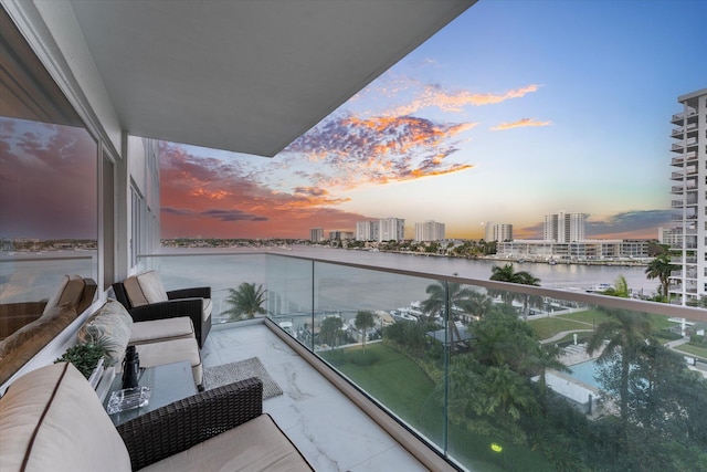 balcony at dusk with a water view