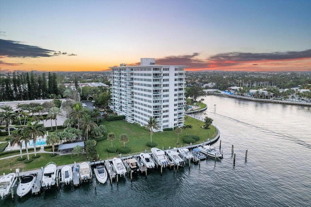 aerial view at dusk with a water view